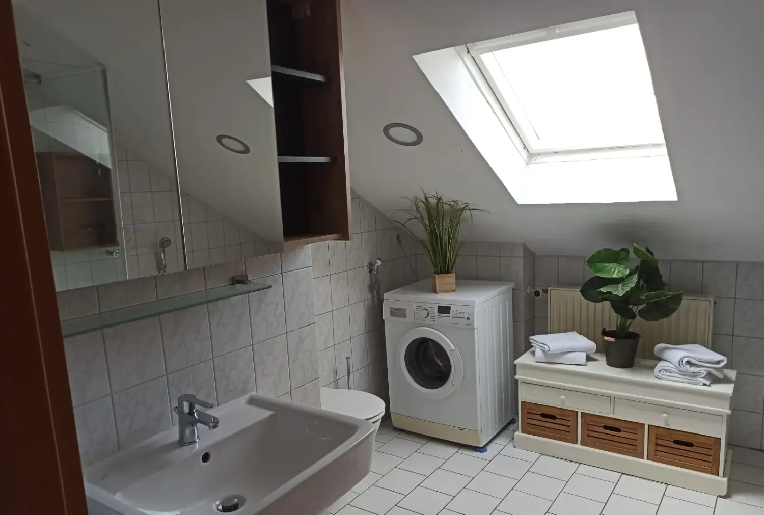 Ferienwohnung fesche Leonie - Badezimmer mit Waschmaschine