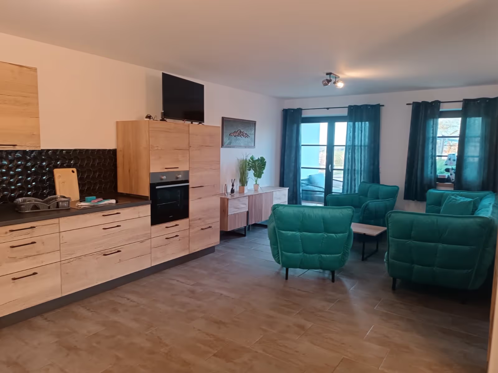 Junior Suite - Wohnzimmer mit Küchenzeile